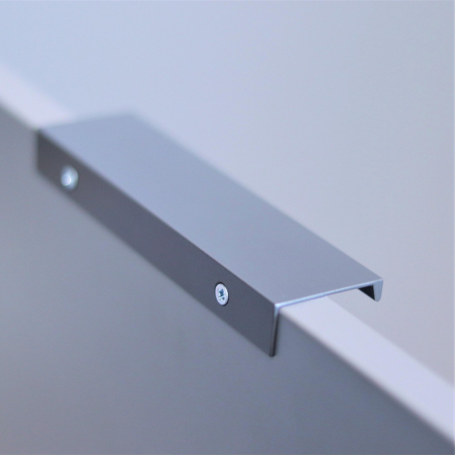 Hidden flat-bar steel edge pull handle detail
