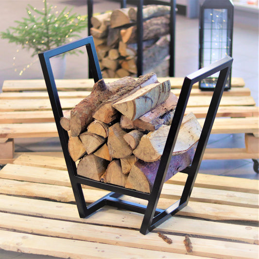 V-shaped steel firewood rack holding stacked logs