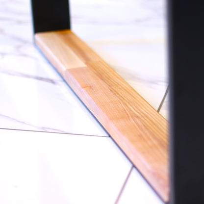 Steel and hardwood table legs, close-up