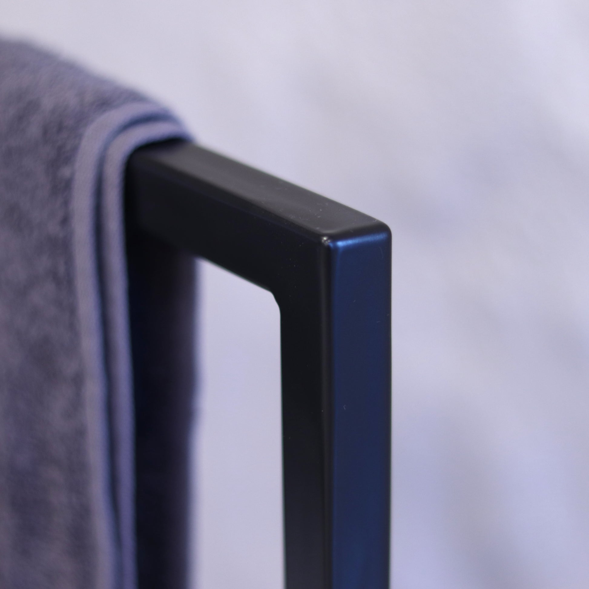 Three-tier steel towel stand for a bathroom
