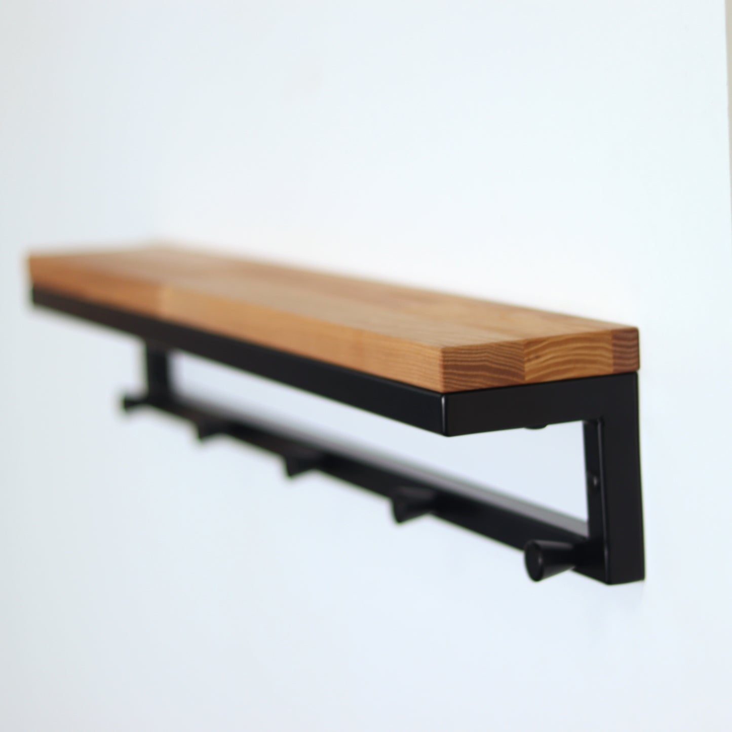 Industrial coat rack shelf with hooks, front view