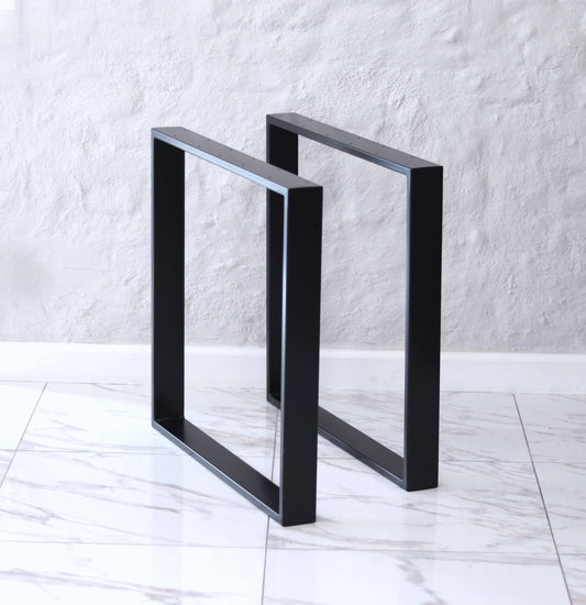Black powder-coated steel table legs, set of two, for a dining table