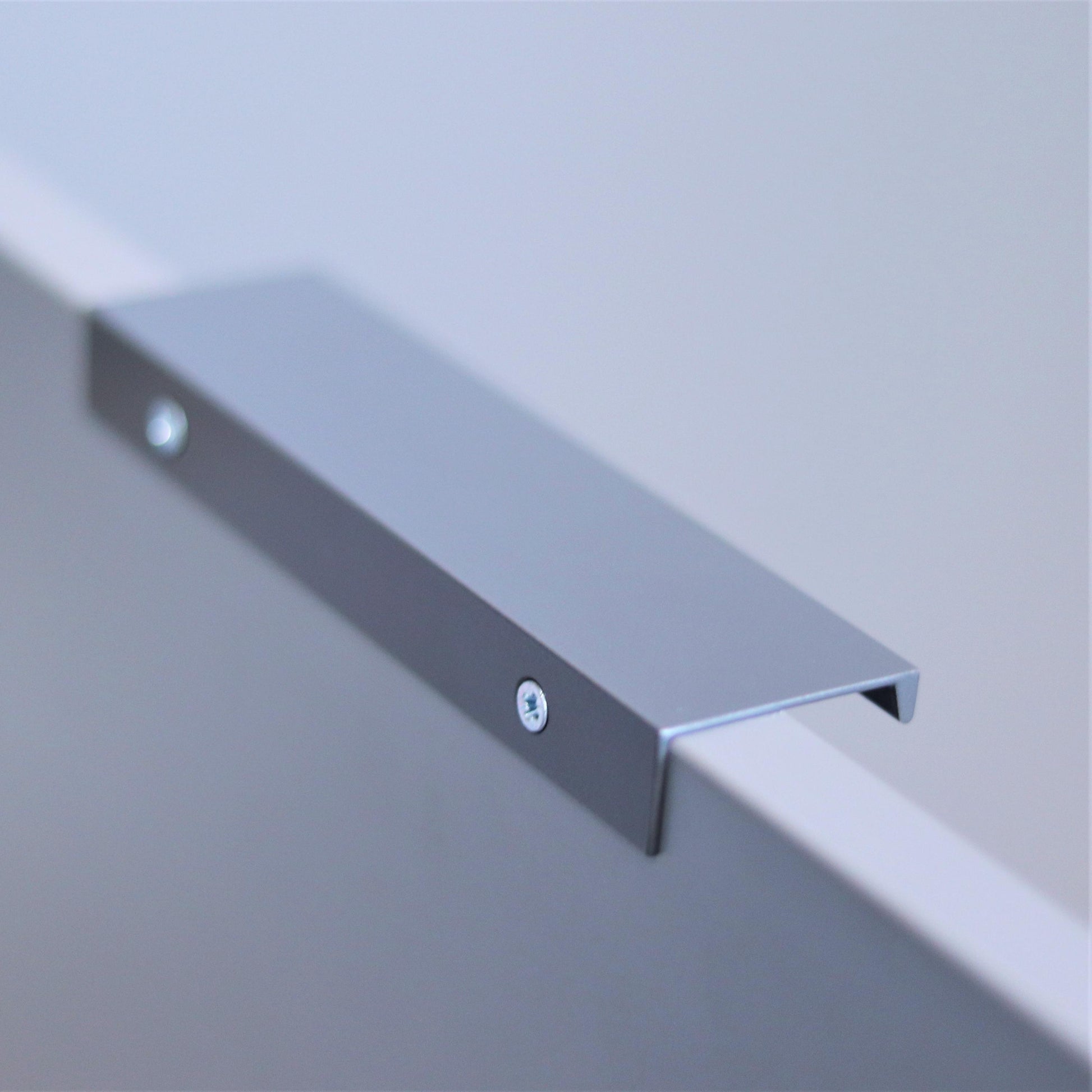 Hidden flat-bar steel edge pull handle detail